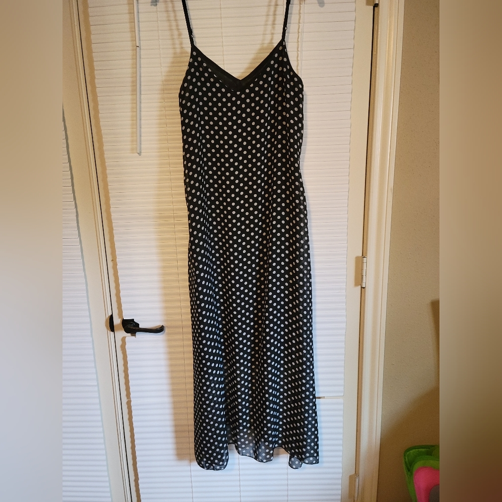 I have no idea where I bought this, but never been worn